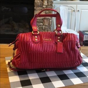 Excellent condition fuchsia colored Coach handbag